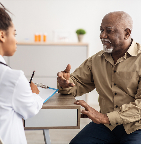 top-apart-img Doctor and Patient having a consultation in medical office