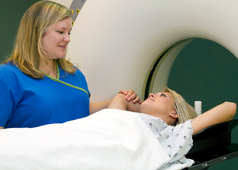 physicists-img Nurse helping patient go into MRI scanner